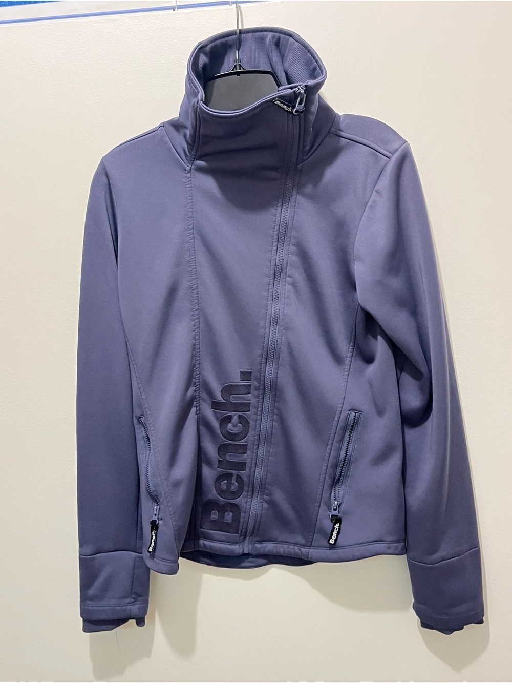 Bench Asymmetric Zip-Up Jacket in Dusty Blue with zip up pockets / High Collar